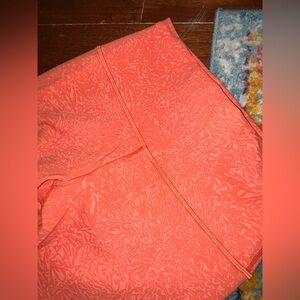 Lululemon size 6 wunder under full length orange patterned leggings